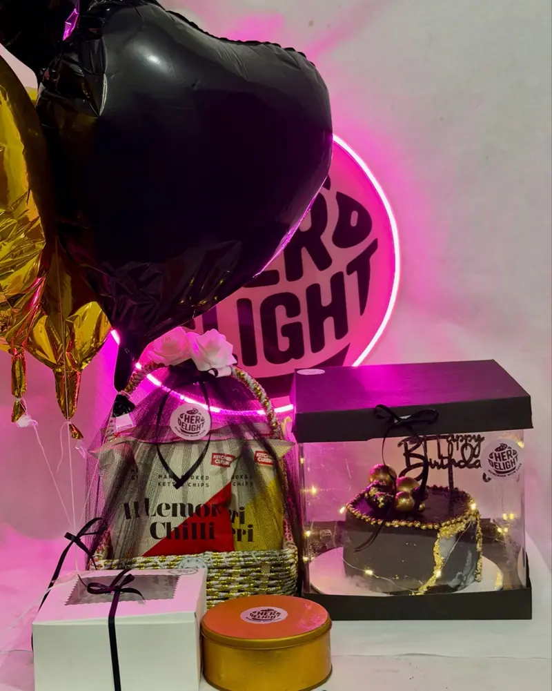 Black and gold surprise celebration cake