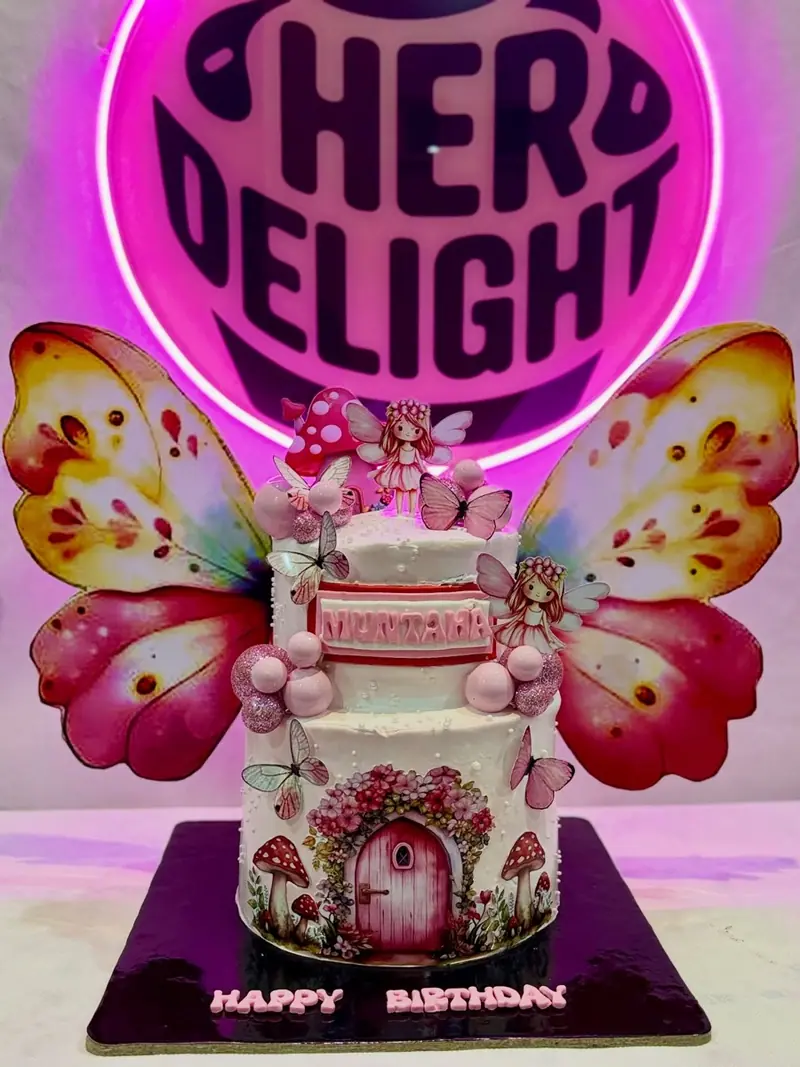 Butterfly fairy themed two-tier birthday cake