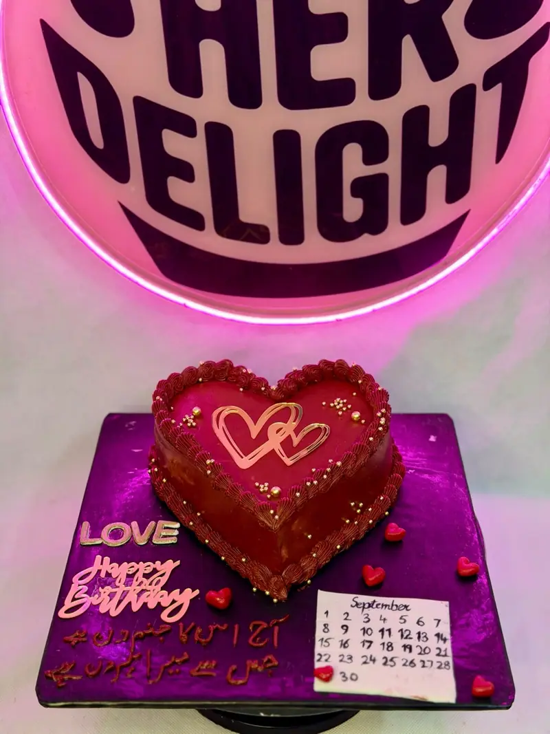 Red heart-shaped celebration cake